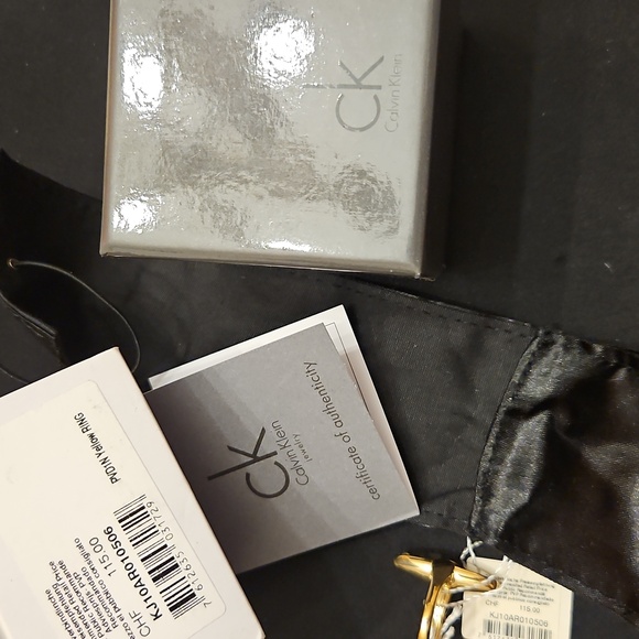 Calvin Klein Gold Ring with Clear Glass Stone With Diamond Cuts - Picture 13 of 13